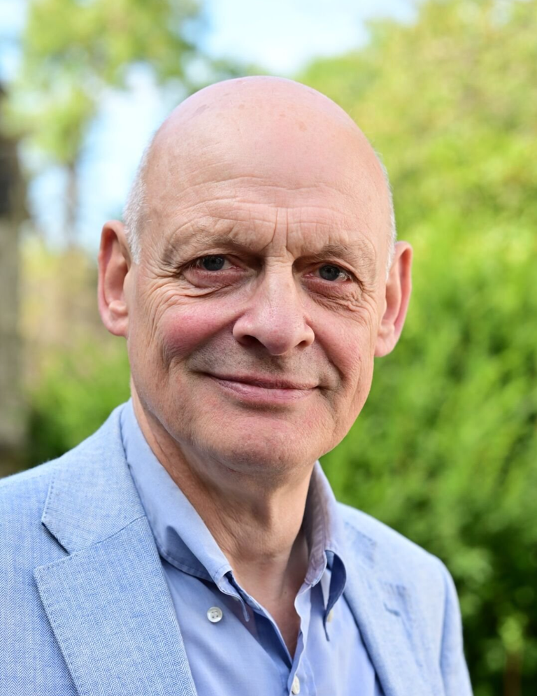 Portrait photo of Reverend John Bridges the author of the book "Maximus and the Blood of Innocents"